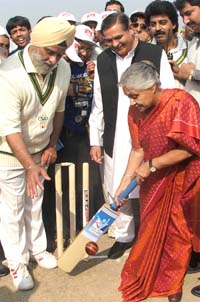 Delhi Chief Minister Sheila Dikshit playing a shot to inaugurate a cricket match between doctors, former cricketers and HIV/AIDS patients