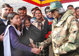 President A.P.J. Abdul Kalam shakes hand with earthquake survivor schoolchildren at Uroosa, the last village on the Indian side of the LoC, 116 km north of Srinagar, on Sunday.