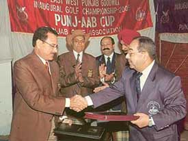 Mr S.K. Sharma, President of the Punjab Golf Association and Maj-Gen Zafar Abbas, President of the Punjab Golf Association, Pakistan, exchange an MoU cementing the golfing ties between the two countries in Chandigarh on Monday