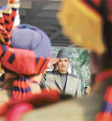 The Jammu and Kashmir Chief Minister, Mr Ghulam Nabi Azad, takes the salute during a guard of honour presented to him during his visit to Ludhiana on Monday