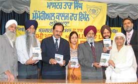 A book of Punjabi writer Tara Singh being released at a function at the Master Tara Singh Memorial College for Women