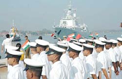 A Chinese naval ship is received by Indian sailors at the Cochin port on Monday.
