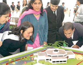 Mentally-challenged children have a close look at the model of Udit centre, in Sector 36, Chandigarh