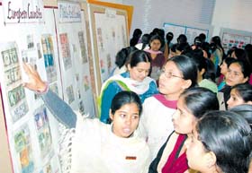 Students looking at the collection of currencies from 40 countries at an exhibition organised by Banarasi Dass Arya Girls College in Jalandhar