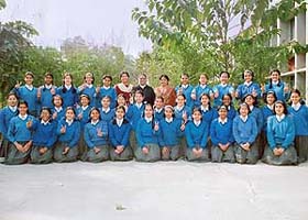 Throwball players of Sacred Heart Senior Secondary School after winning three team titles in the UT Inter-School Throwball Tournament