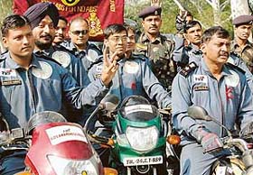 Members of the Armed Forces Medical Services AIDS awareness motorcycle rally during the flag-off ceremony in Chandimandir