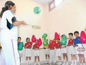 Children of The Gurukul, Sector 20, Panchkula, play with racquets and balloons as part of fungame activity