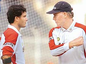 Indias coach Greg Chappell talks to former captain Sourav Ganguly during a practice session at the M.A.Chidambaram Stadium in Chennai