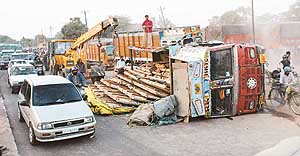 Traffic on the Chandigarh-Panchkula highway was blocked after a truck overturned at the transport light point.