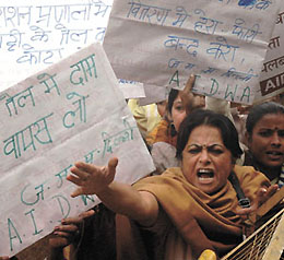 Activists of All India Democratic Women Association demonstrating against corruption in distribution of food supplies and price hike of oil outside Krishi Bhavan in the Capital on Thursday