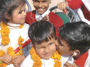 SPREADING HOPE AND LOVE: Physically challenged children celebrate World Disabled Day at Prayaas in Sector 38 in Chandigarh on Friday.