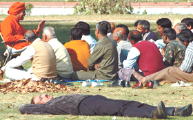 Government employees getting a taste of spirituality at the Boat Club lawns during the lunch break on Friday.