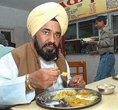 Mr Shamsher Singh Dullo, President of the Punjab Predesh Congress Committee, has lunch at the AICC canteen in New Delhi on Friday. 