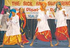 Mentally-challenged students of Prayas School perform bhangra to mark the World Disability Day in Jalandhar on Saturday.