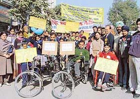 Disabled children held a rally from Punjabi Bhavan to Feroze Gandhi Market on Saturday on World Disability Day