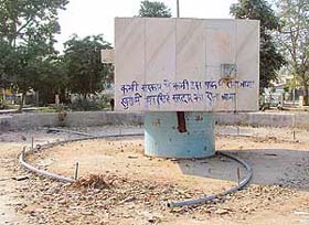 Graffiti on the wall of the fountain at Chattar Singh Park, Ludhiana, reflects its neglect