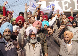Government teachers protest against the privatisation of the government schools in Amritsar on Saturday.
