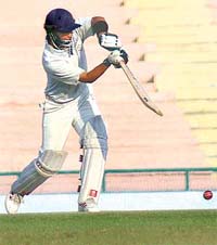 Mahesh Rawat of Haryana plays a shot during the third day of the Ranji Elite group B match against Punjab at the PCA stadium in Mohali