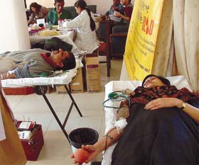 Anita Sharan, wife of Foreign Secretary Syam Sharan, donating blood at a camp organised by External Affairs Spouse Association & Rotary Blood Bank, at Kasturba Gandhi Marg in the Capital