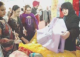 Visitors at Indo-Pak trade fair in Amritsar on Saturday.