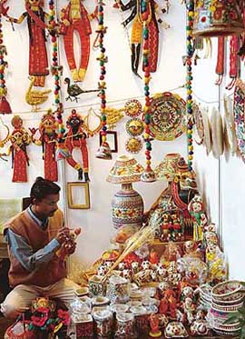 Craftsmen from Madhubani, Bihar, display articles made of sikki grass at the CII exposition in Chandigarh on Tuesday. 