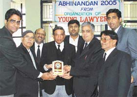 District Bar Association chief Balwinder Goel being honoured at a function organised by the Organisation of Young Lawyers at Ludhiana