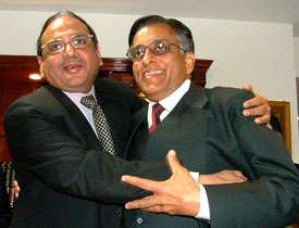 Acting CBI Director J.K. Dutt is welcomed by outgoing Director U.S. Mishra at the CBI Headquarters in New Delhi on Tuesday