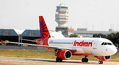 An Indian Airlines (IA) new Airbus A319 aircraft stations on the tarmac upon its arrival at the IGIA in New Delhi 