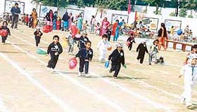 Children take part in balloon race on the opening day of the annual sports meet of the BCM Arya School Kindergarten section