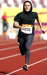 Melani Artoum of Iran competes in the second heat of the womens 100m at the 3rd West Asian Games in Doha on Wednesday