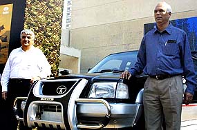 P.M. Telang, President, Light and Small Commercial Vehicles along with Shyam Mani, Vice-President, Sales and Marketing, Tata Motors, pose at the launch of Tata TL 4x4 sports utility truck 