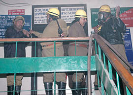 Firemen at the site of a fire which broke out in Vikas Bhawan in the Capital on Thursday.