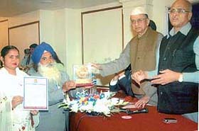 Dr Amar Singh Udhaan, a retired senior entomologist of PAU being conferred with the Vijay Shree Award 2005 in New Delhi