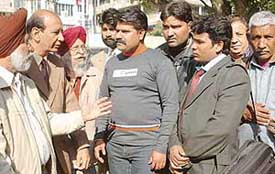 Members of the Trade Promotion Council interact with shopkeepers from Pakistan in Sector 17, Chandigarh, on Friday. 