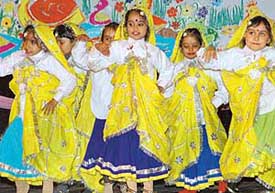 Students of Saupins School, Sector 9, Panchkula, present a Haryanvi folk dance during the annual day function at Tagore Theatre in Chandigarh on Friday. 