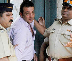 Bollywood actor Sanjay Dutt comes out from a TADA court after being produced for a special hearing in connection with the Mumbai serial blasts case in Mumbai on Friday.