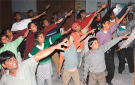 HAPPY HOURS: Slum children preparing for the big day.