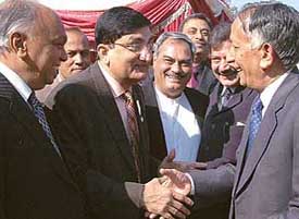 A Supreme Court Judge, Mr Justice Ashok Bhan, shares a lighter moment with Mr Arif Choudhary, president of the Pakistan chapter of the Indo-Pak Friendship Society, and Punjab Finance Minister Surinder Singla and Haryana Excise and Taxation Minister Venod Sharma at a function in Chandigarh on Saturday.