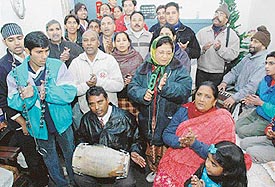 Devotees singing carols prior to the Christmas celebrations in Chandigarh on Sunday. 