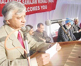 Mr TKA Nair, Principal Secretary to the Prime Minister, addressing members of Malayalee Samajam, Mohali, on Sunday. Mr Raghunath Sahay Puri, Minister for Urban Development and Housing, Punjab, and Mr Bir Devinder Singh, MLA, Kharar, are also seen in the picture.