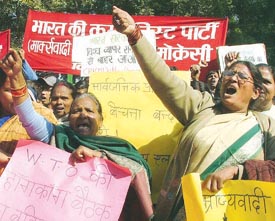 Activists of CPI (M) protesting against the forthcoming WTO meeting to be held in Hong Kong at Jantar Mantar in the Capital on Monday. 