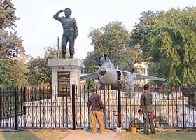 Workers spruce up the statue of Flying Officer, Nirmaljit Singh Sekhon, as the mini secretariat in Ludhiana