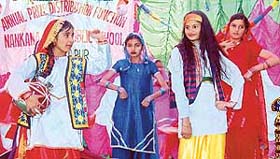 Students of Nankana Sahib School present a dance at the annual prize distribution function in Kila Raipur