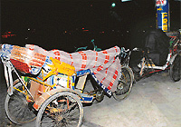There is just a thin blanket between the man and the cold night.
