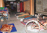The corridors play bed to these rickshaw-wallahs after they have pedalled away the day