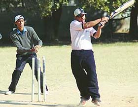 Ayush of Viklang Shishu Special School, Karnal, in action during the All-India Open Cricket Tournament for mentally challenged children at GMSSS, Sector 35