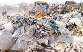 Junk being removed during a demolition drive in Industrial Area, Phase 1, in Chandigarh