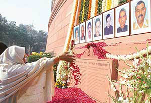 Jayawati, widow of slain Head Constable of Delhi Police Bijender Singh, during a floral tribute ceremony marking the fourth anniversary of the attack on Parliament