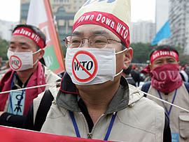 South Korean farmers participate in an anti-WTO protest