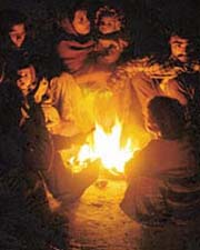 With the mercury dipping to a record low on Wednesday, the homeless in Jalandhar try to find solace around a bonfire